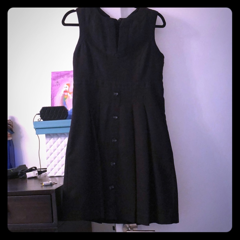Tulle black sleeveless dress with back bow detail